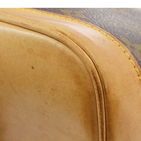 LOUIS VUITTON Alma Monogram Handbag - Picture 4 of 9
